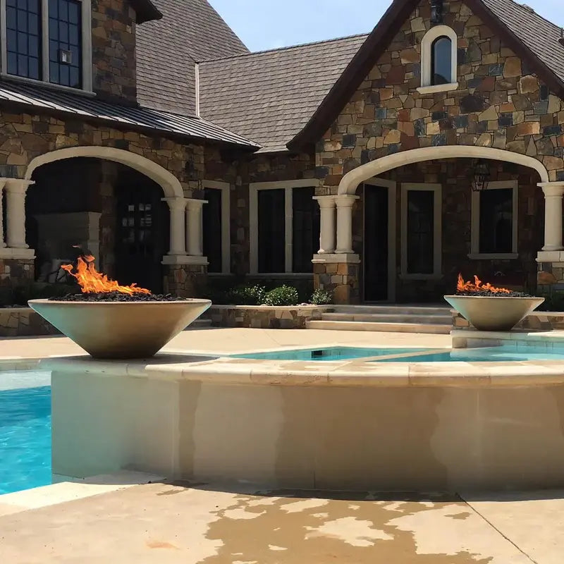 The Outdoor Plus 24” Cazo Round Concrete Fire Bowl outdoor fire feature

24 inch Cazo round concrete fire bowl with active flame

Close-up of concrete texture on The Outdoor Plus 24 Cazo fire bowl

Outdoor patio with The Outdoor Plus 24 Cazo round concrete fire bowl