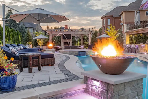 the outdoor plus cazo hammered patina copper fire bowl exterior view

the outdoor plus cazo copper fire bowl round fire pit flame at night

the outdoor plus cazo fire bowl patio setup close-up copper finish and burner

the outdoor plus cazo copper fire bowl burner interior detail