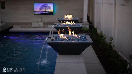 the outdoor plus maya fire and water bowl exterior view

the outdoor plus maya hammered copper fire water bowl patio setup

the outdoor plus maya fire and water feature lit at night with flame and water spillway

the outdoor plus maya copper fire and water bowl stainless steel burner close up