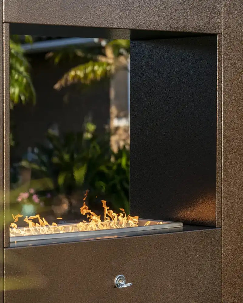 the outdoor plus williams fireplace metal firebox exterior view

the outdoor plus williams fireplace patio fireplace lit at night

the outdoor plus williams fireplace powder-coated steel firebox front detail

the outdoor plus williams fireplace outdoor fire feature stainless fire pan